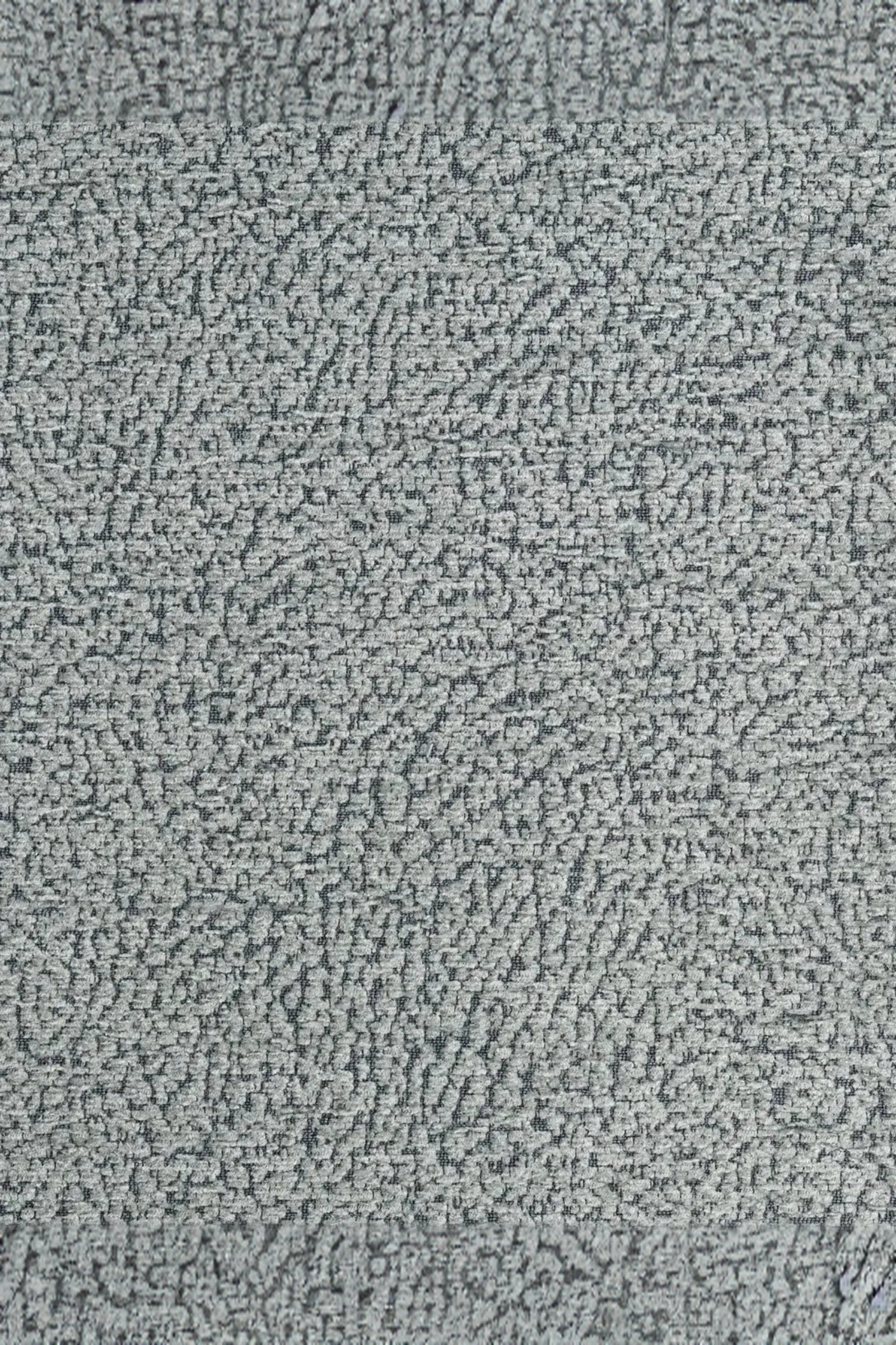 Light grey textured carpet with abstract pattern, luxury interior flooring sample