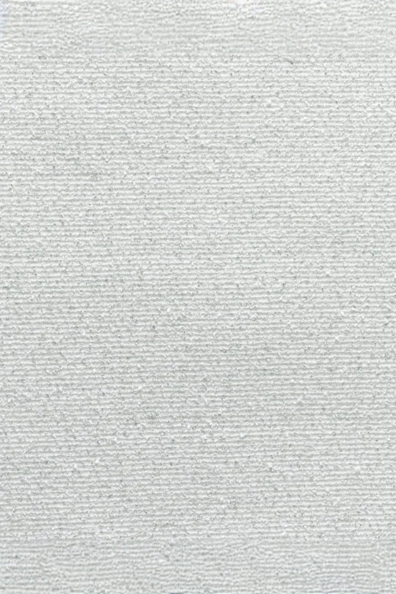 Light grey textured wall finish with subtle horizontal lines, modern interior surface