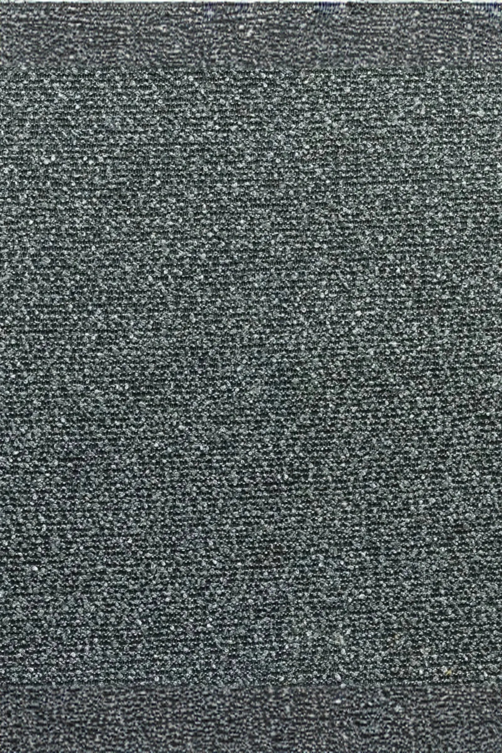 Close-up of grey textured fabric upholstery, ideal for luxury home interiors