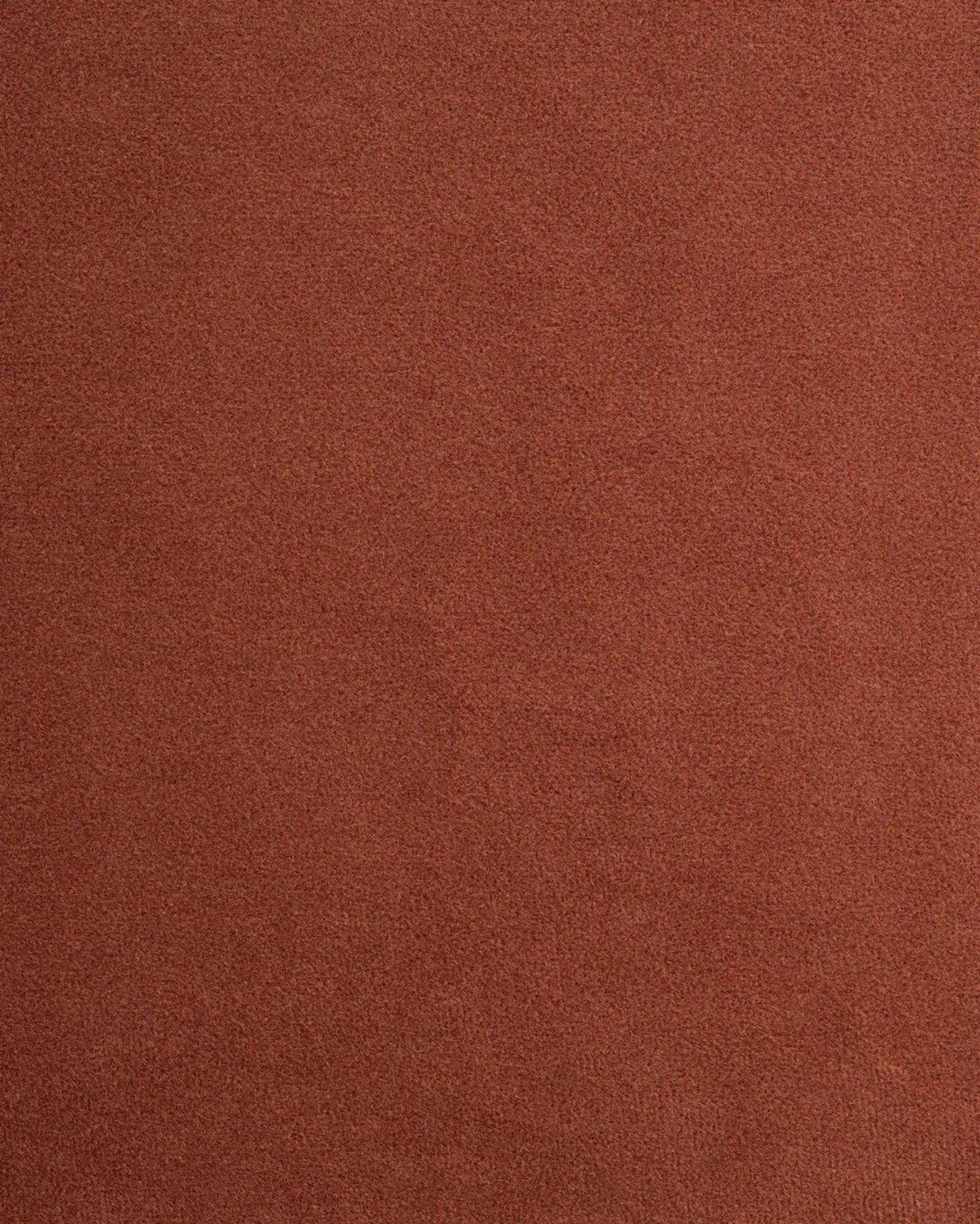 Copper-colored textured surface, close-up material sample for luxury interiors