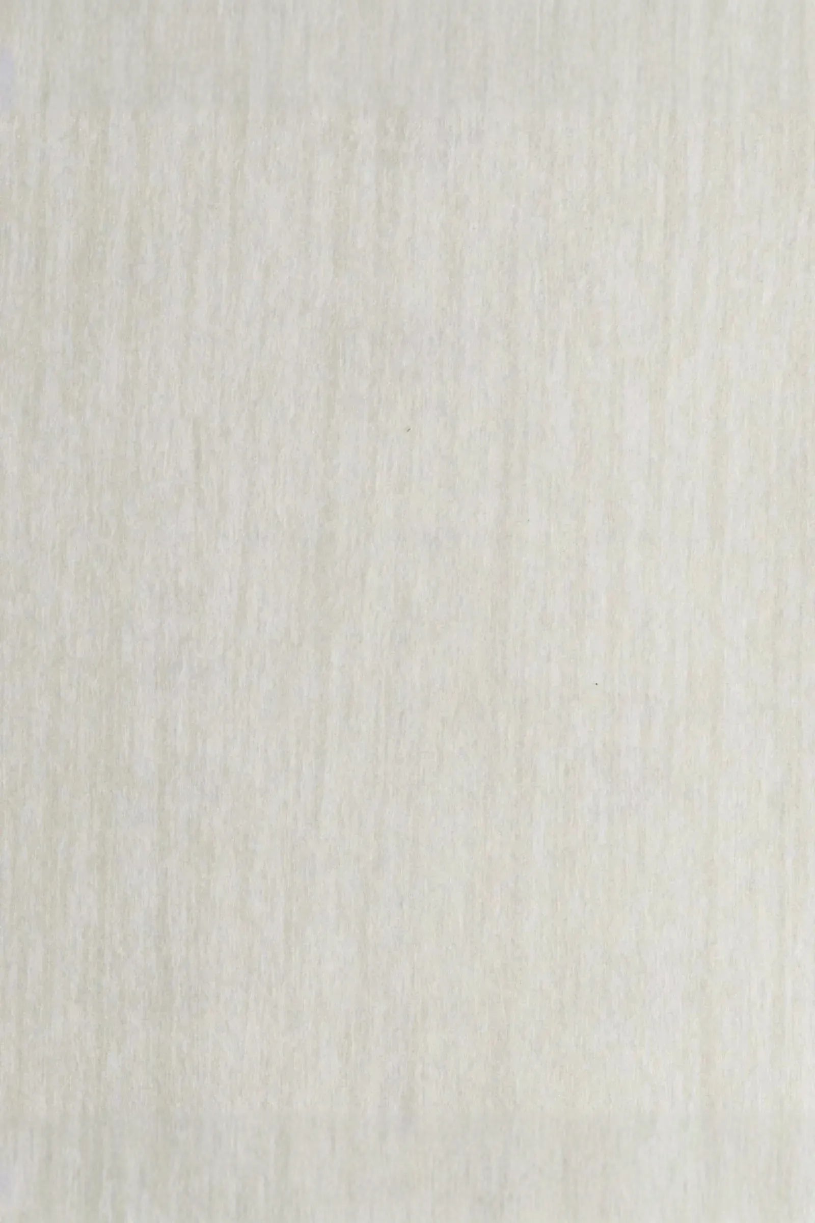 Beige textured fabric with a subtle, natural linen weave pattern, suitable for bedding or upholstery.