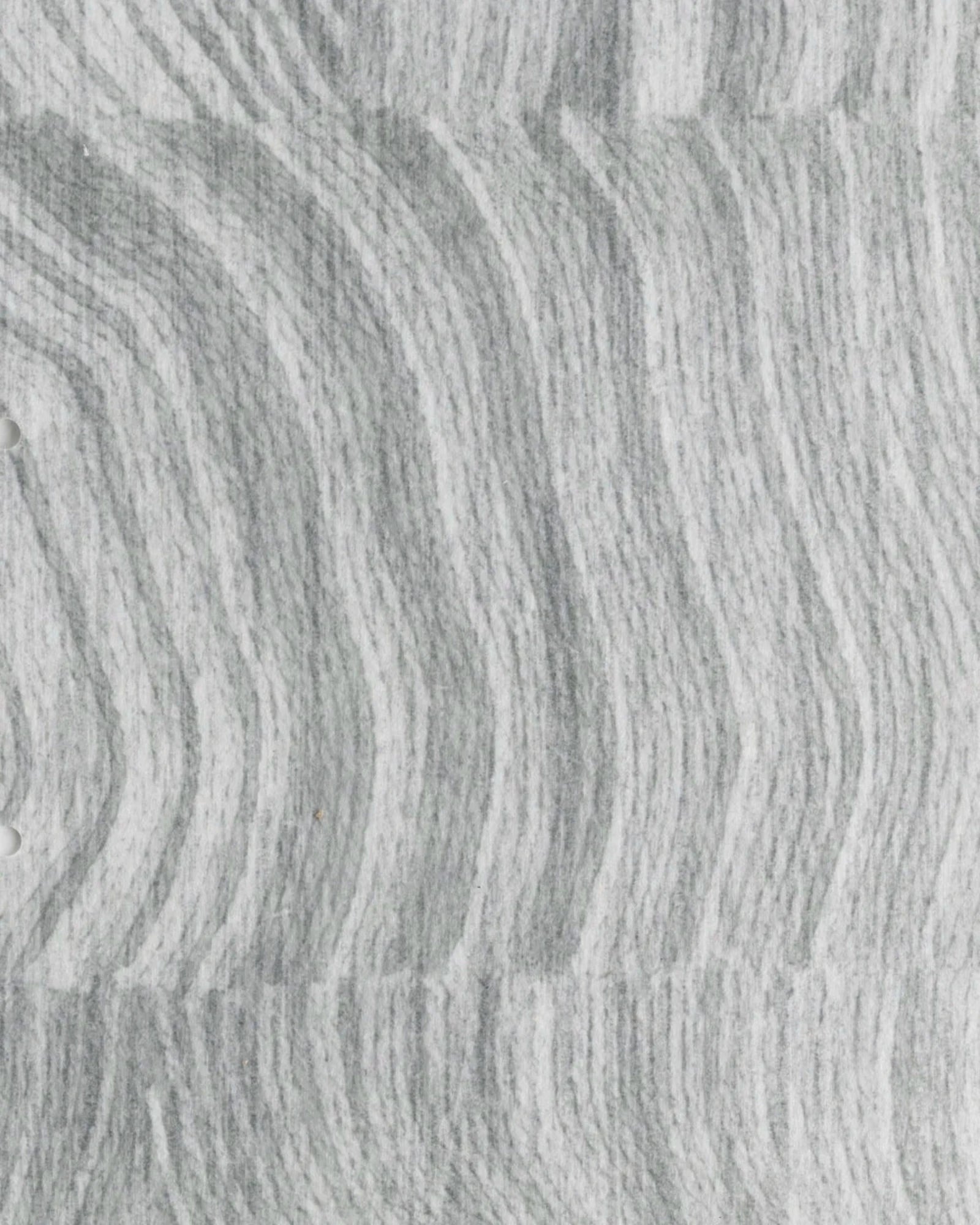 Close-up of grey mineral pattern textured fabric with wavy stripes