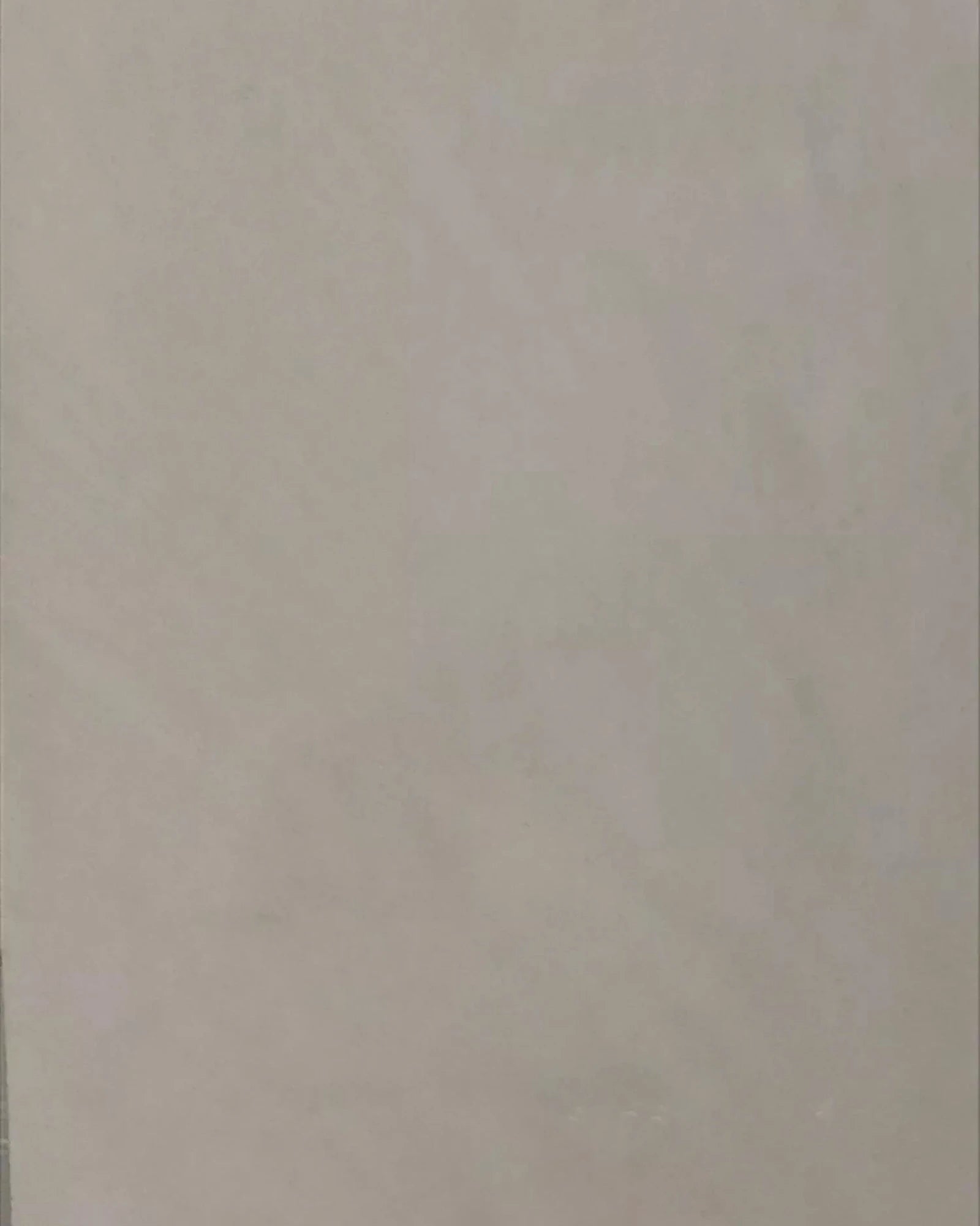 Beige marble slab with subtle veining, suitable for luxury interior design.