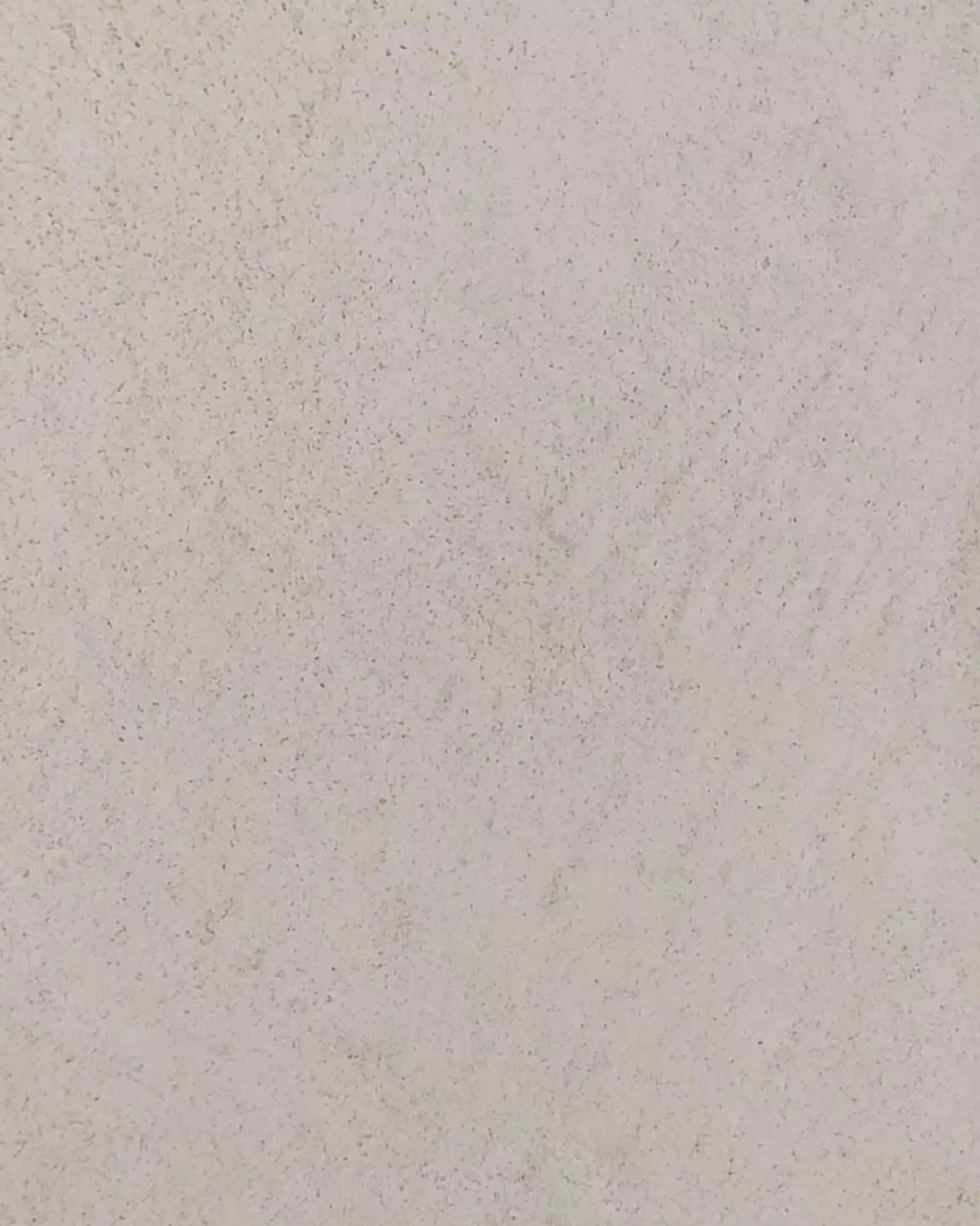 Light beige textured stone surface, ideal for luxury interior wall or flooring design