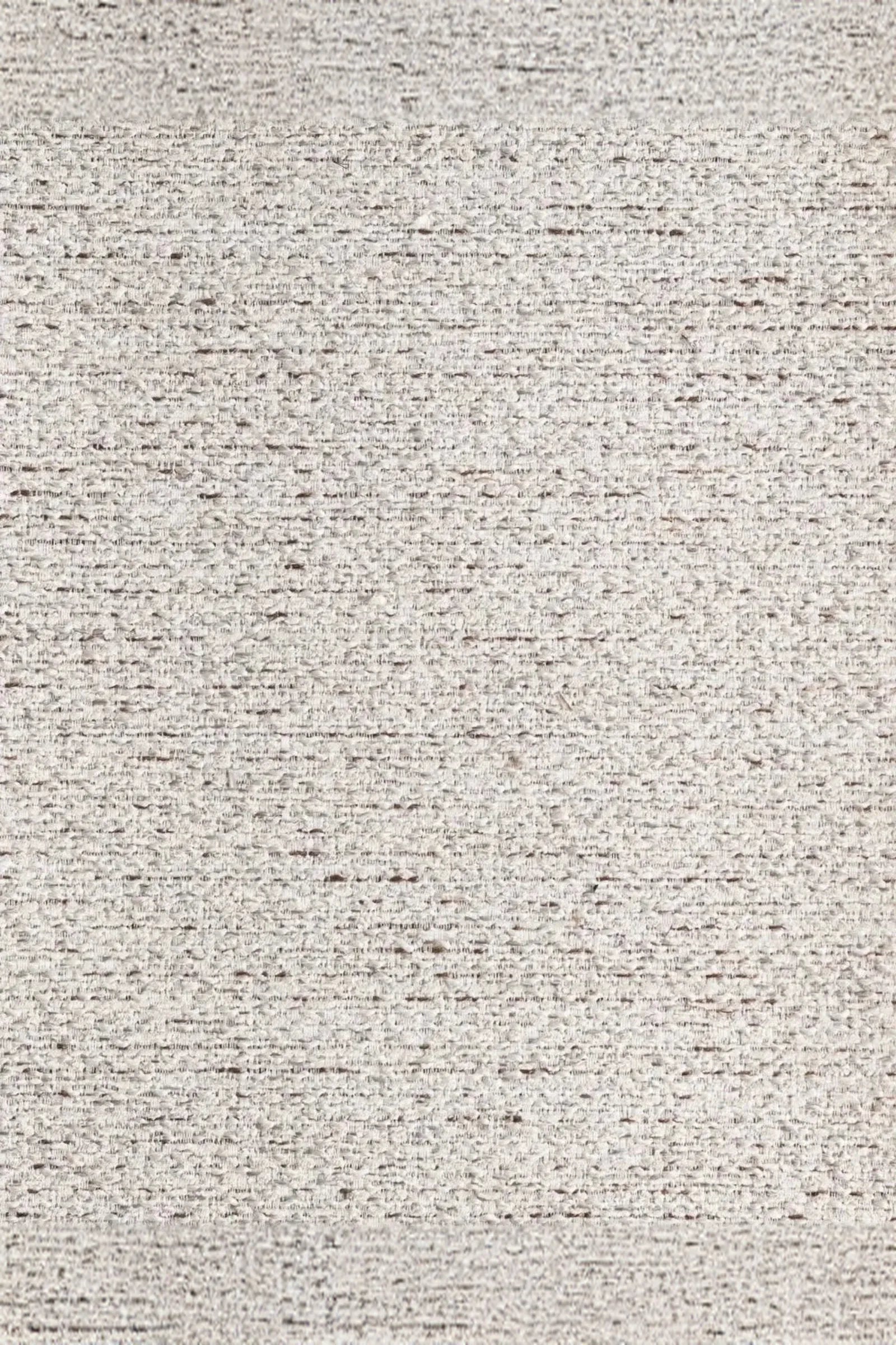 textured light beige woven fabric upholstery close-up