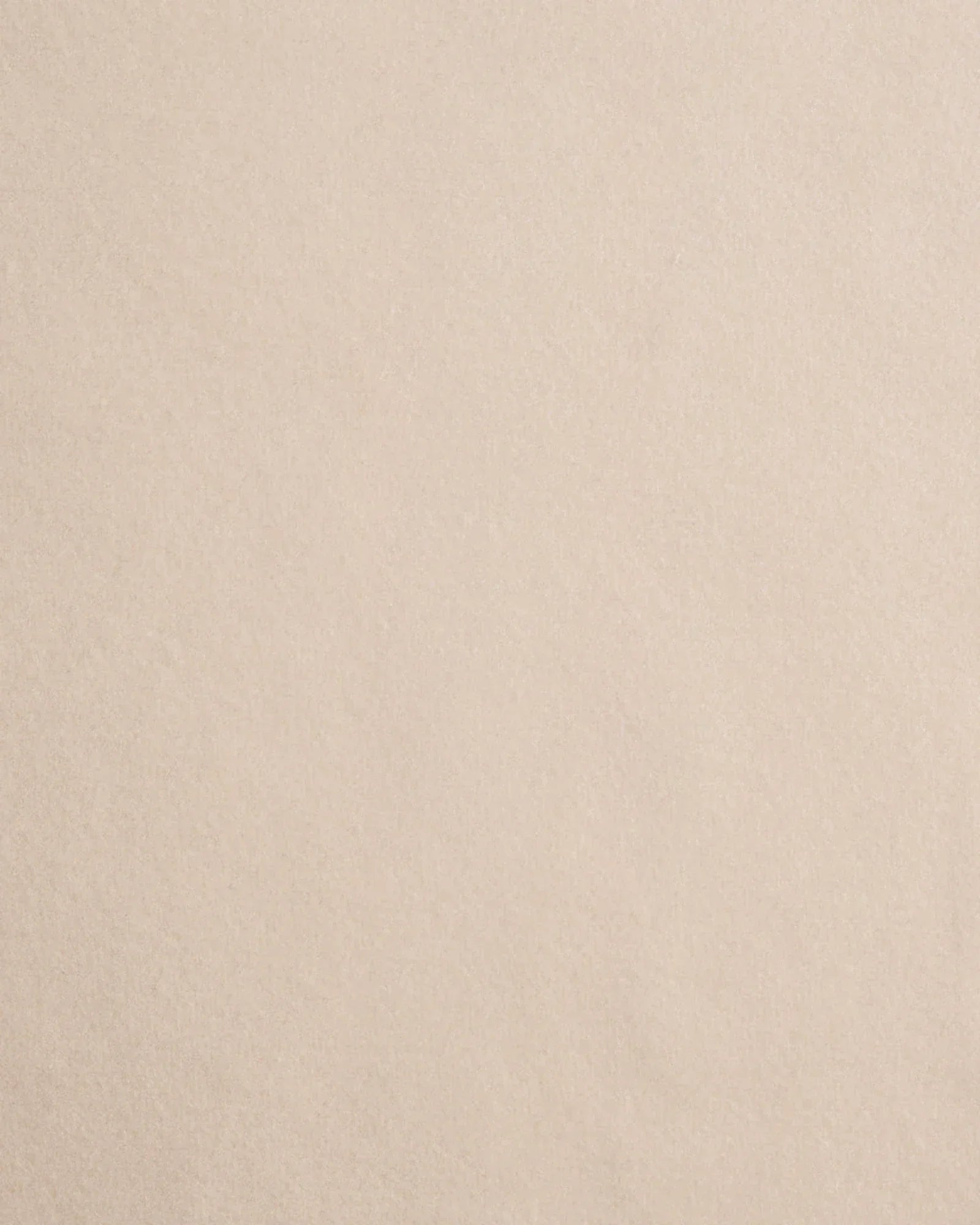 neutral beige powder texture, soft surface, luxury interior material sample