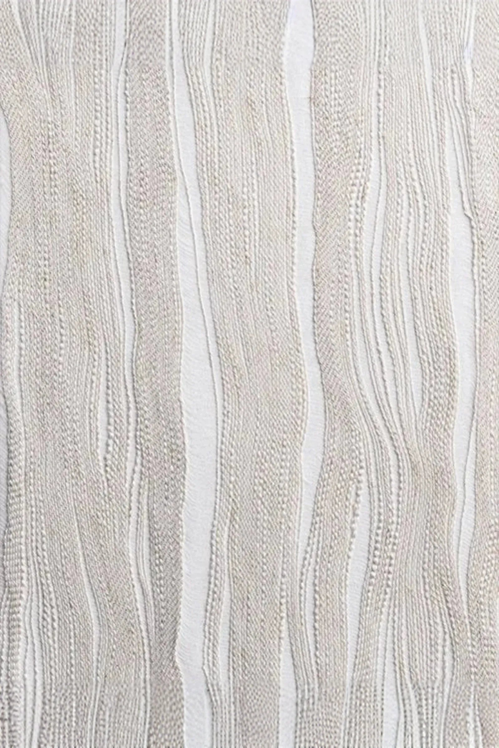 Close-up of textured, cream-colored woven fabric with vertical, wavy lines pattern.