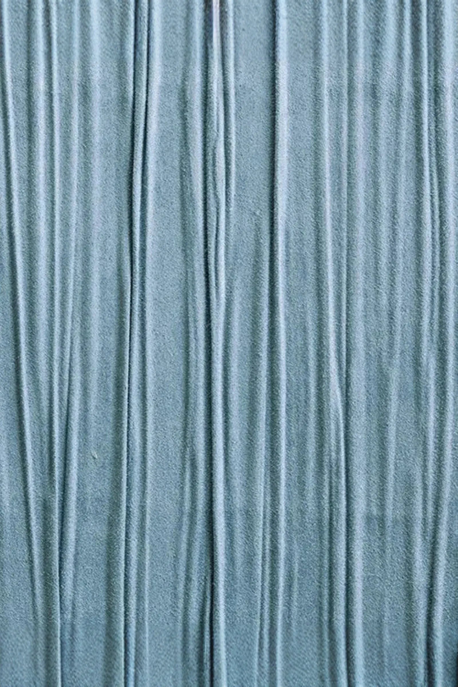 Light blue textured fabric with vertical pleated lines, luxury interior textile