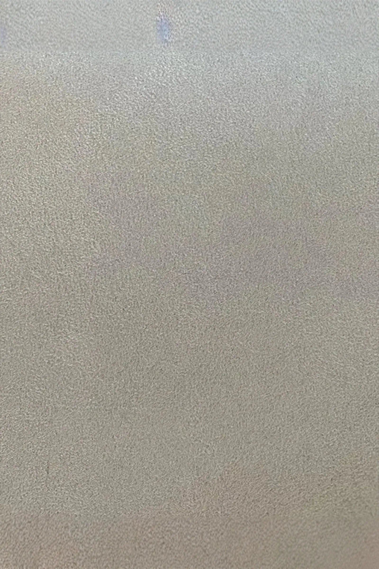 Beige suede fabric texture sample for luxury interior design