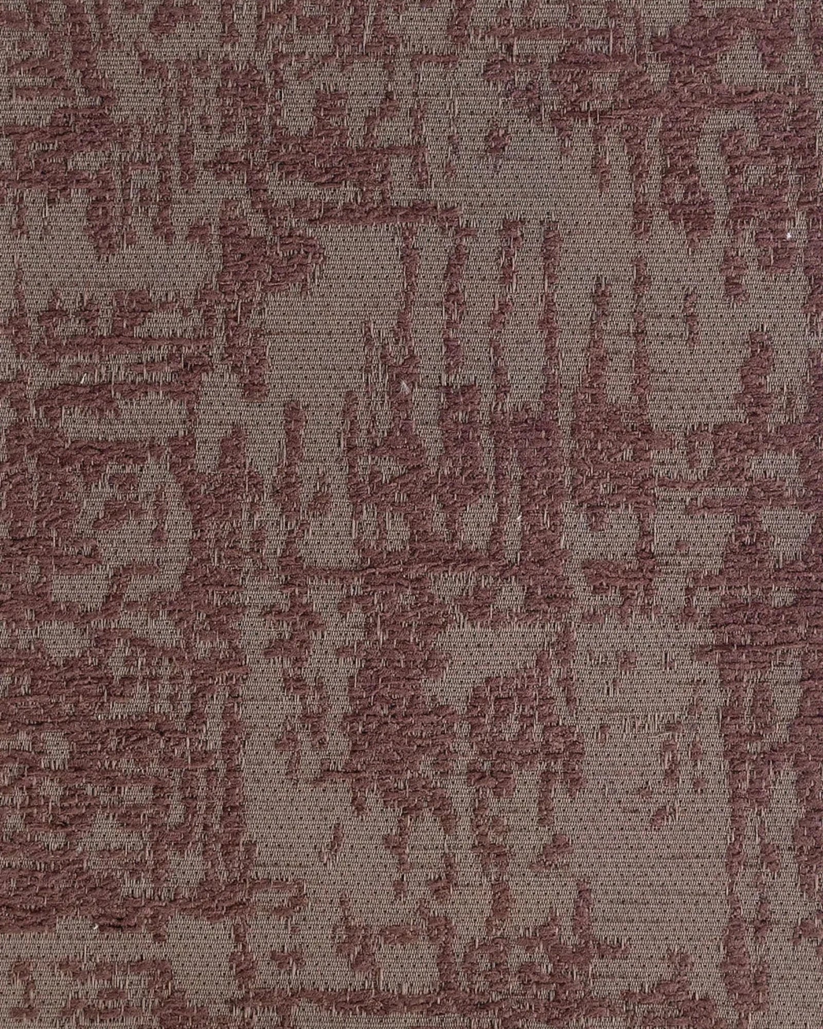Close-up of textured woven fabric with abstract mauve and taupe pattern