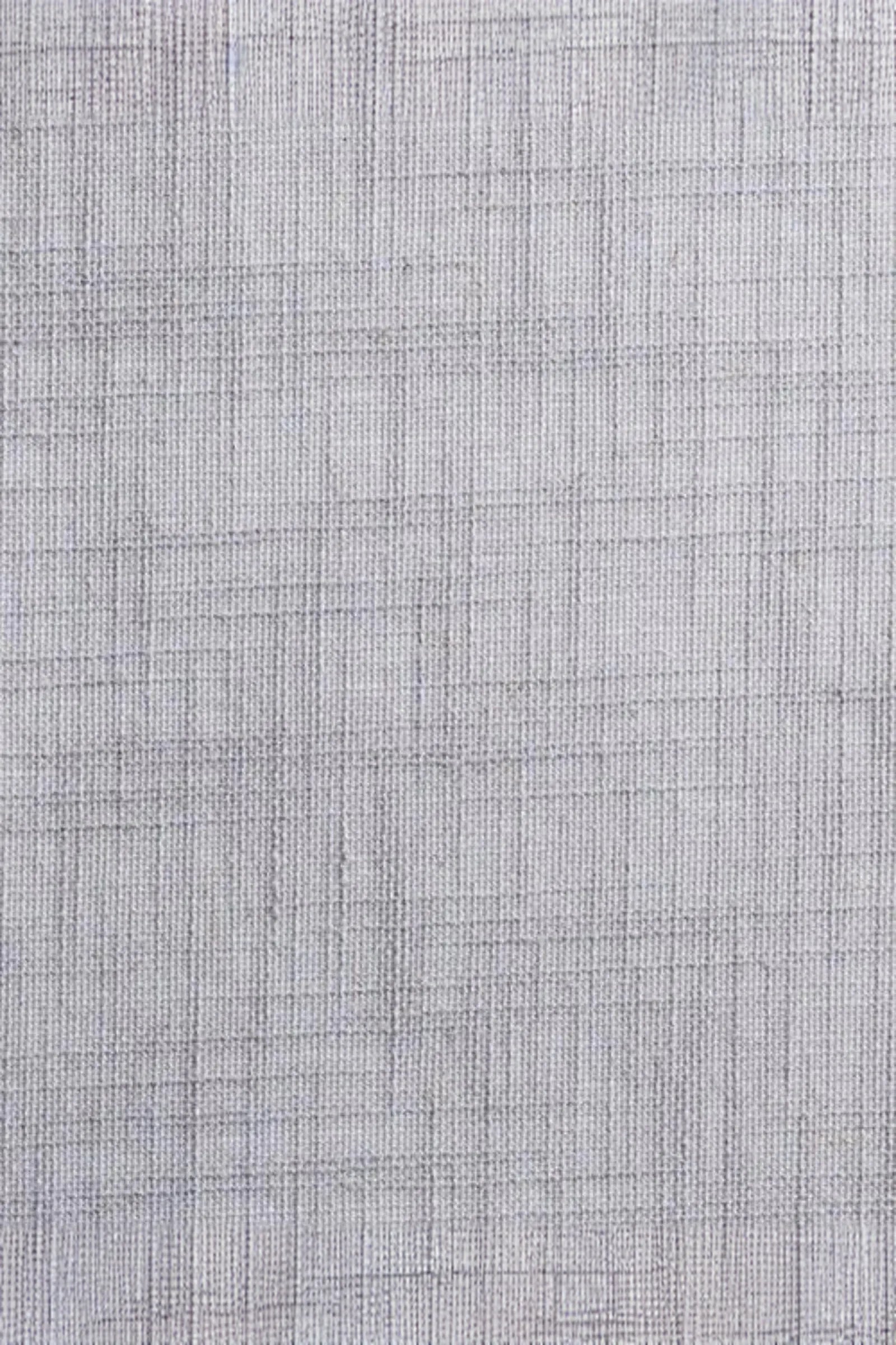 Close-up of light grey textured woven fabric with a subtle grid pattern