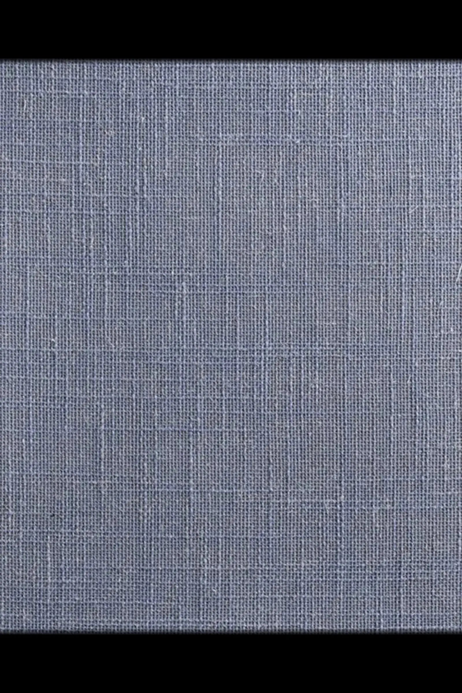 Close-up of blue woven linen fabric texture for luxury interior design