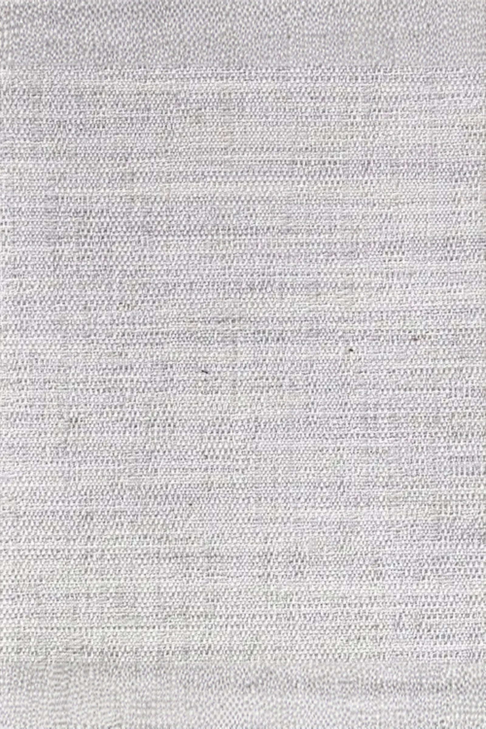 Close-up of textured light grey woven fabric for luxury interior design.