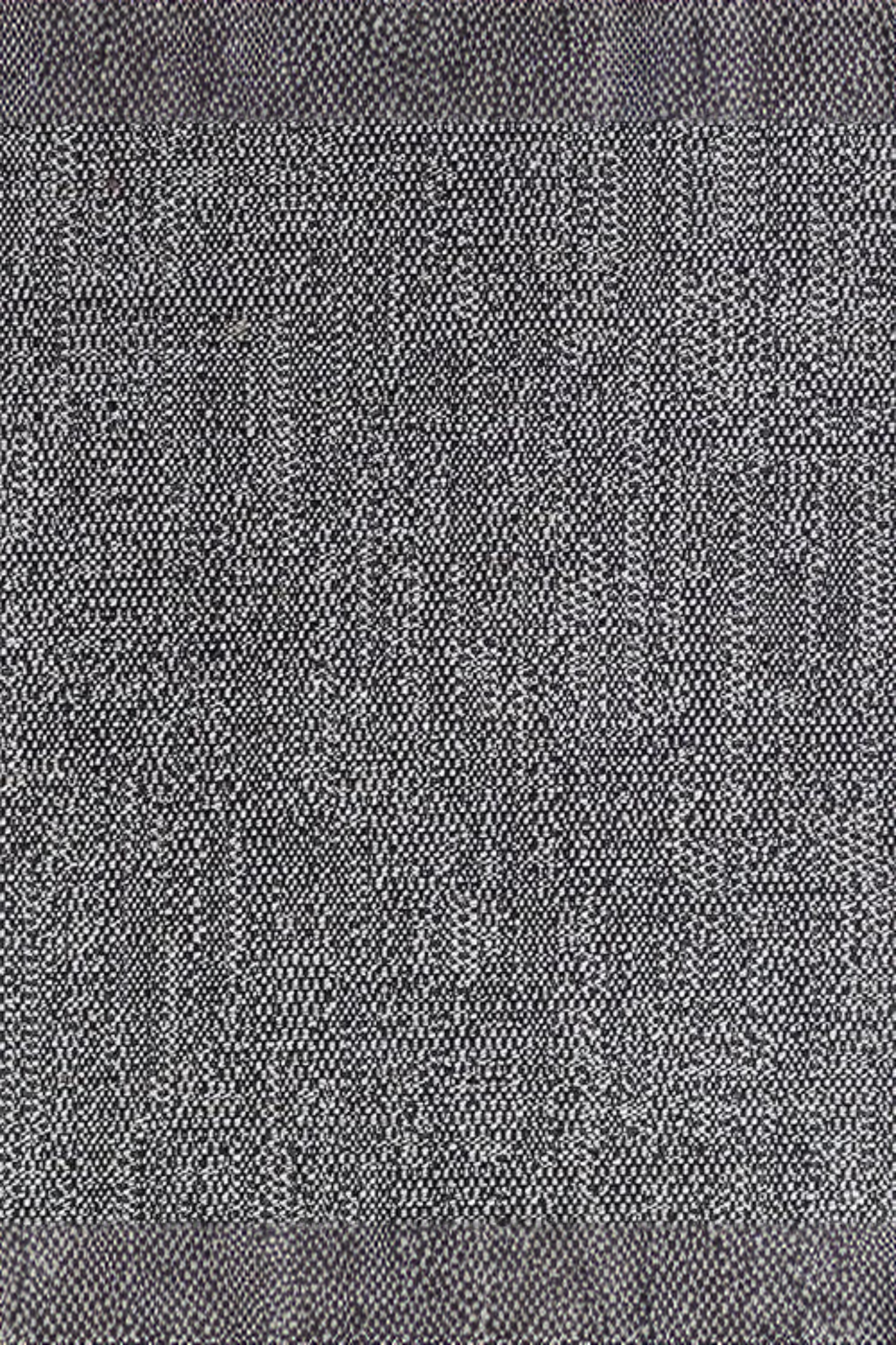 Close-up of textured grey woven fabric, luxury interior material sample
