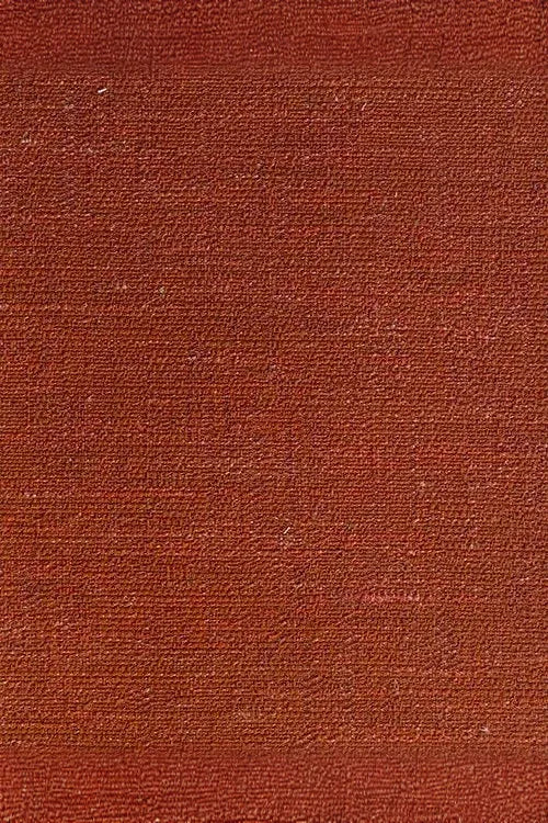 Close-up of terracotta textured woven fabric for luxury interior design