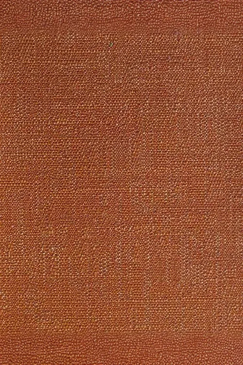 Close-up of textured brown woven fabric, ideal for luxury interior design upholstery