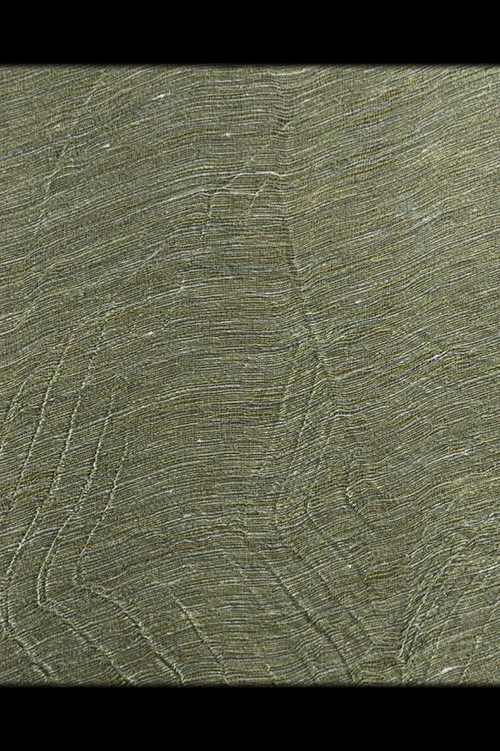 Textured green woven fabric with organic, flowing line pattern for luxury interior design