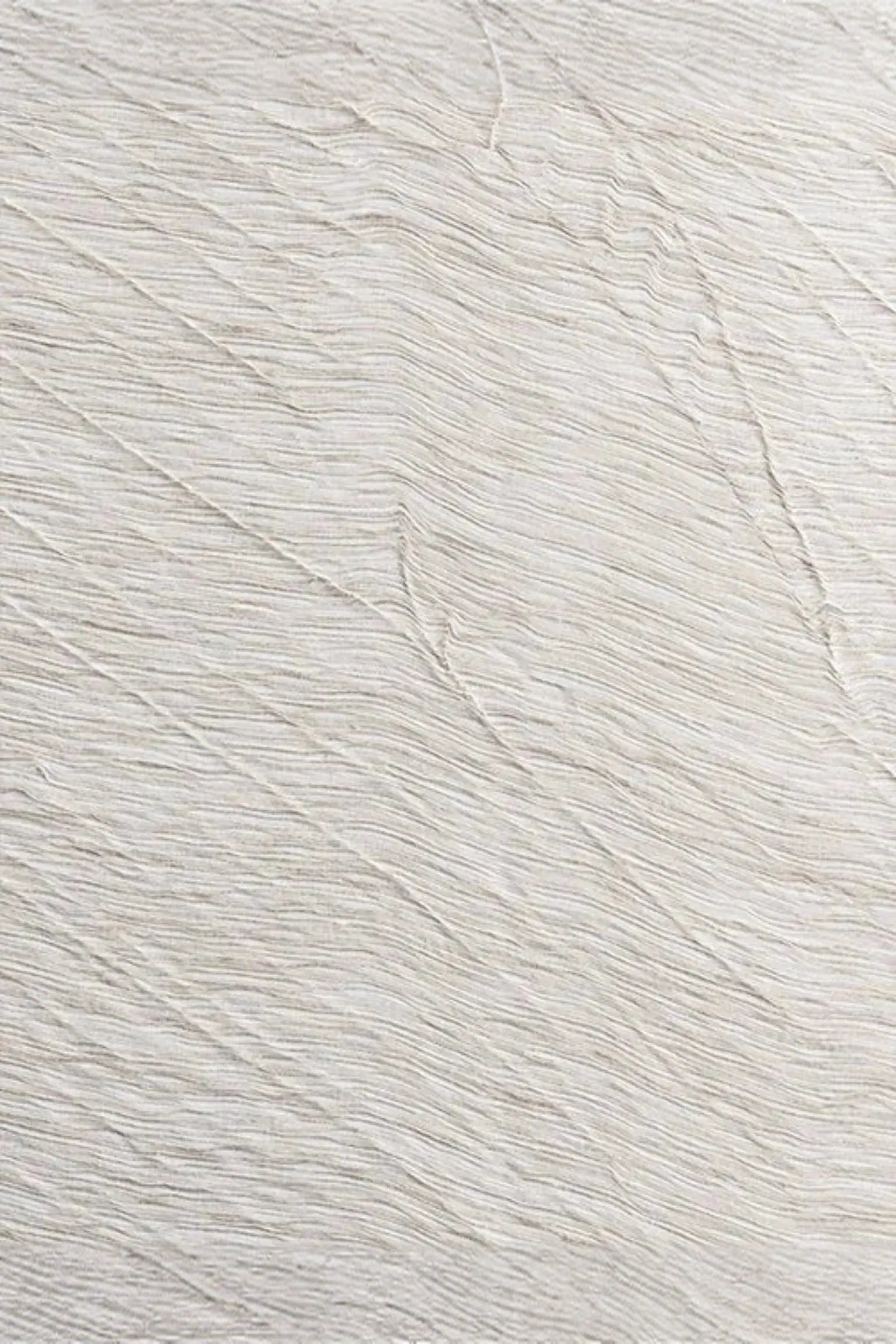 Textured light beige woven fabric with subtle wave pattern, luxury interior textile