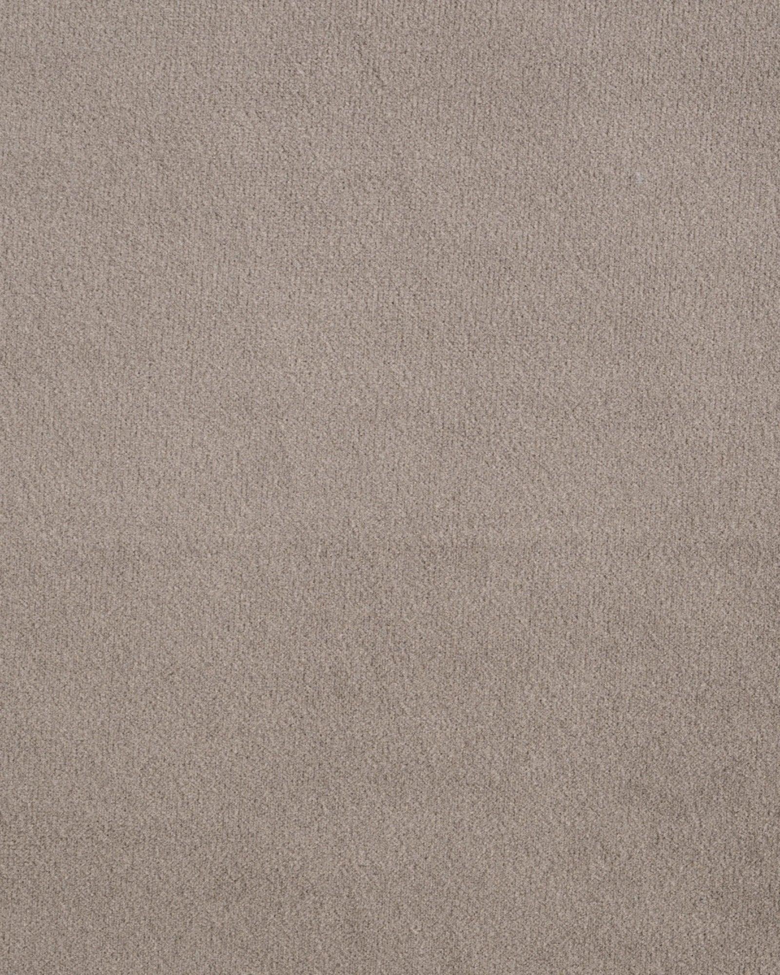 Beige textured carpet material sample for luxury interior design