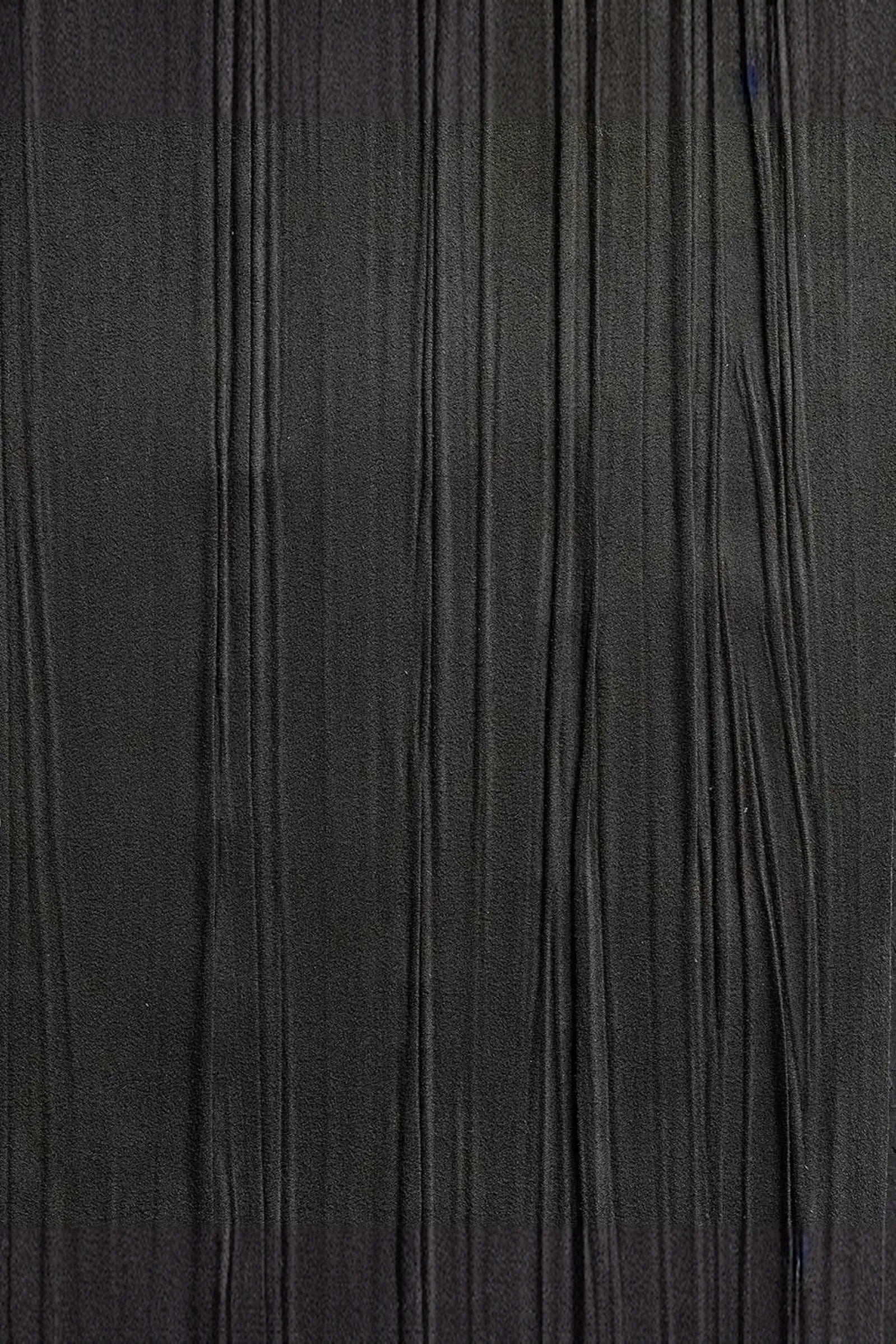Textured black vertical wood panel with natural grain pattern, luxury interior material