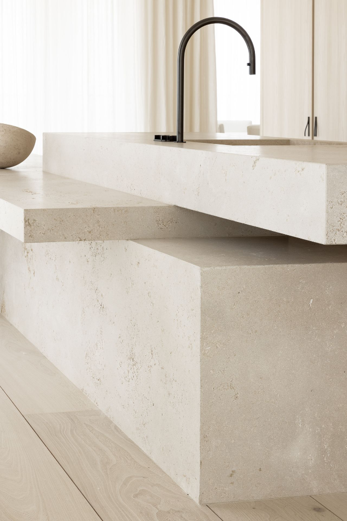 Tailor-made Belgian kitchen island in natural stone by Obumex, curated by Bureau Kersten