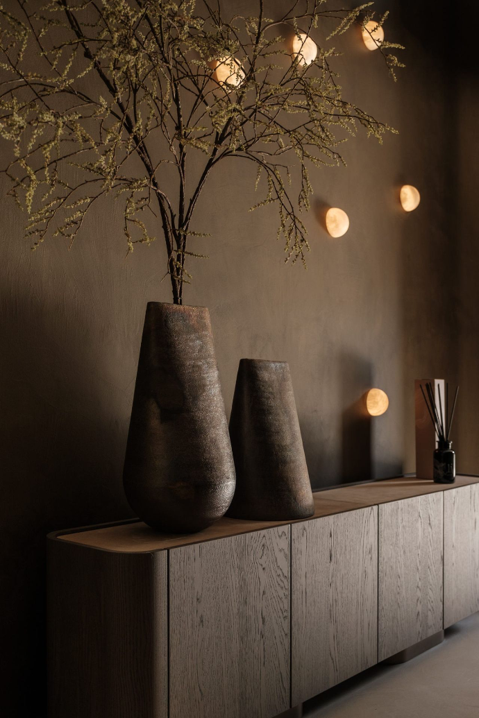 Sideboard with sculptural table lamps by Nila