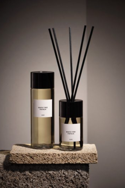 Room fragrance bottles by Nose &amp; Partners on a stone plinth 